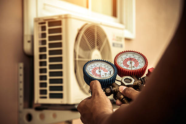Professional Ductwork Repair technician working in West, TX